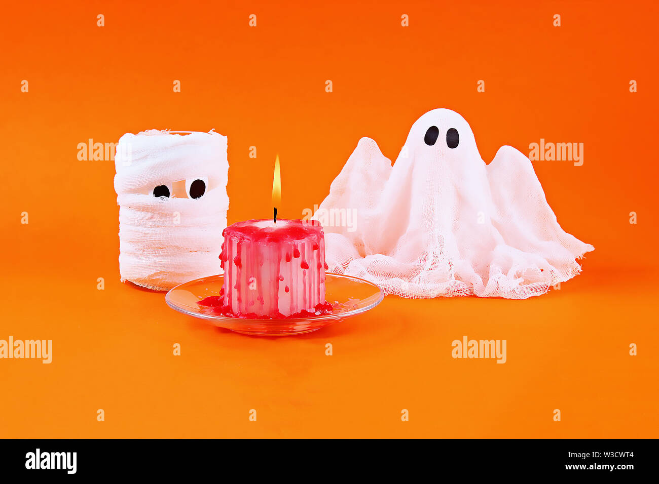 Halloween Ghost Of Starch And Gauze On Orange Background Gift