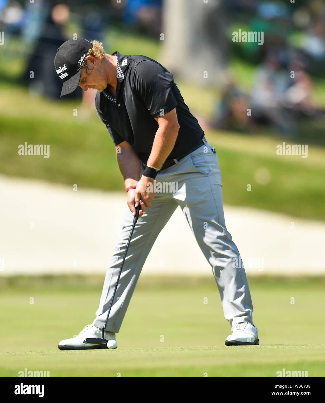 Silvis, Iowa, USA. 14th July, 2019. PGA golfer Bud Cauley lines up a putt on the green of the 18th hole during the final round of the John Deere Classic Sunday, July 14, 2019, at TPC Deere Run in Silvis. Credit: Meg Mclaughlin/Mmclaughlin@Qconl/Quad-City Times/ZUMA Wire/Alamy Live News Stock Photo