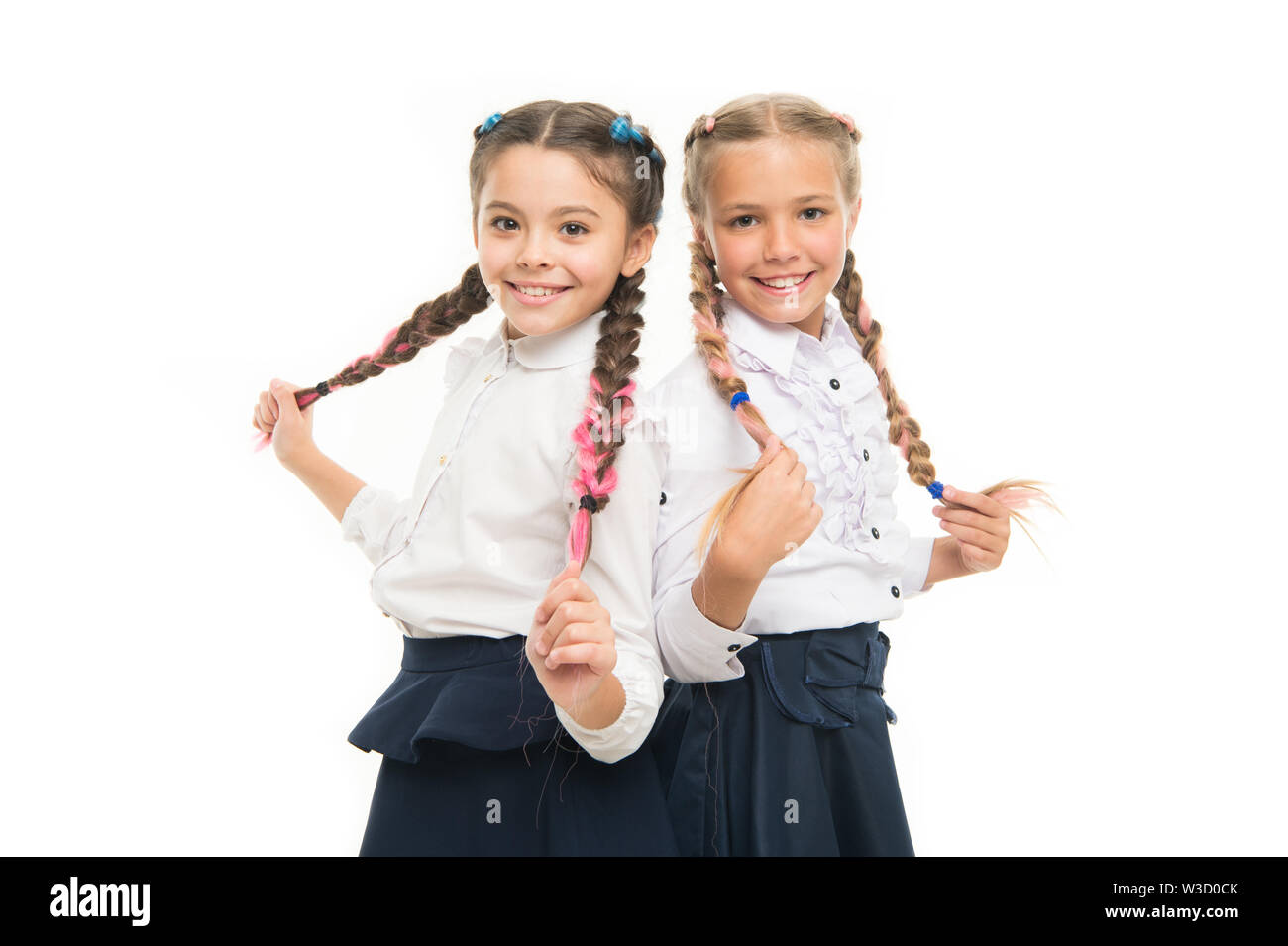 Braiding Hair Adorable Little Girls With Plaited Hair Isolated On White Cute Small Children Holding Long Hair Braids Wearing School Uniform Luxurious Hair Extensions Stock Photo Alamy