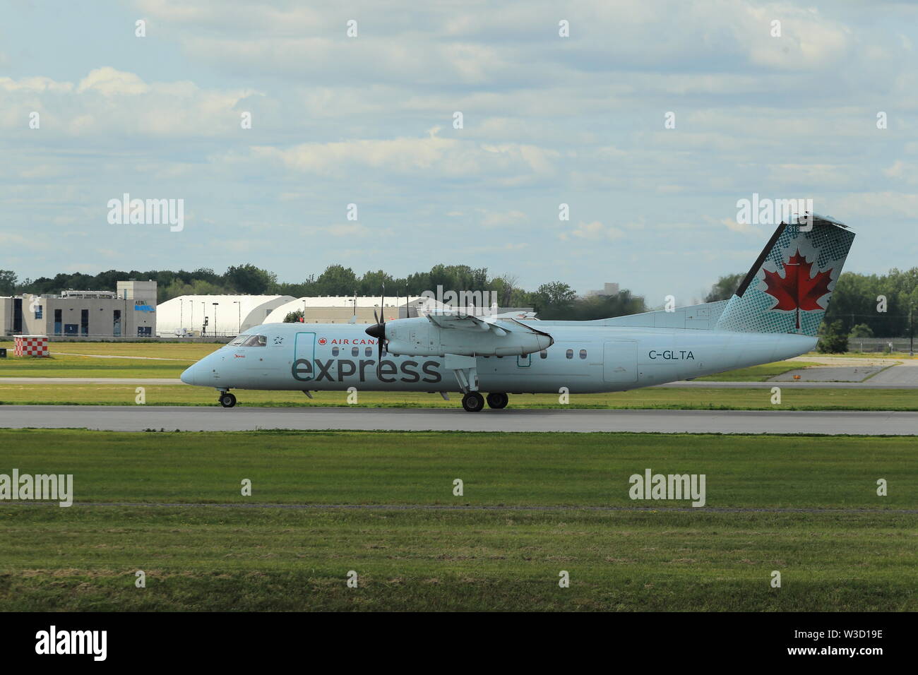 Quebec,Canada. An air Canada Dehavilland Dash 8  at the Montréal–Pierre Elliott Trudeau International Airport Stock Photo