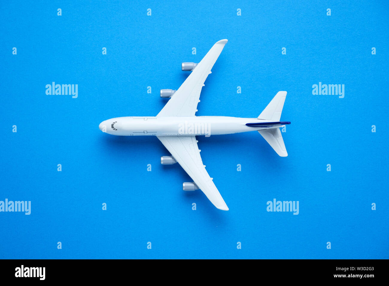 Model airplane on blue pastel color background Stock Photo