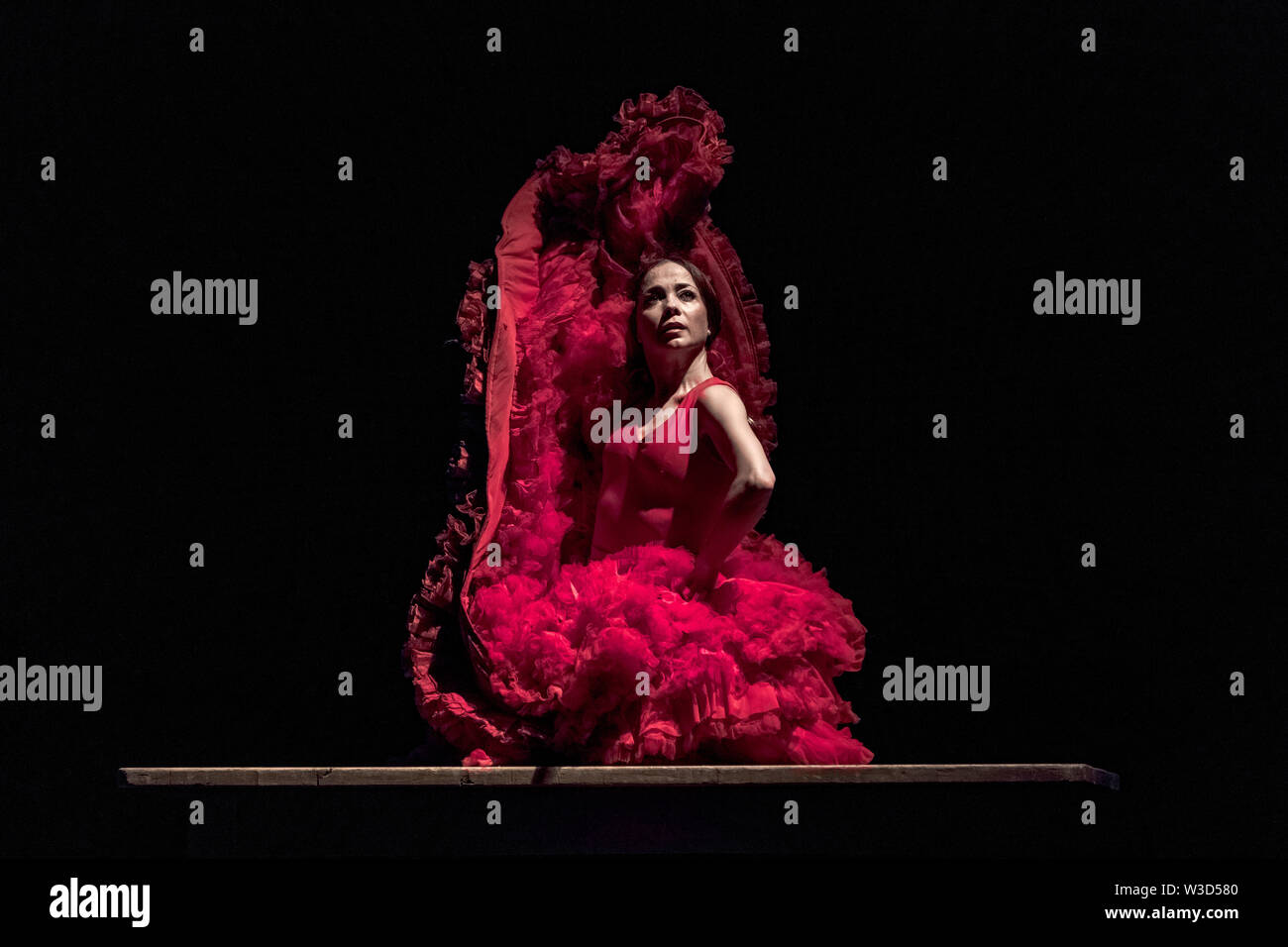 London, UK. 11th July 2019. Olga Pericet dances her performance ‘The Thorn That Dreamed of Being a Flower or The Flower That Dreamed of Being a Dancer’ during the 16th Flamenco Festival at Sadler's Wells theatre. Pericet, known for creating a world full of evocative imagery through a combination of theatre and dance, was the recipient of the Spanish National Dance Prize in 2018. Credit: Guy Corbishley/Alamy Live News Stock Photo