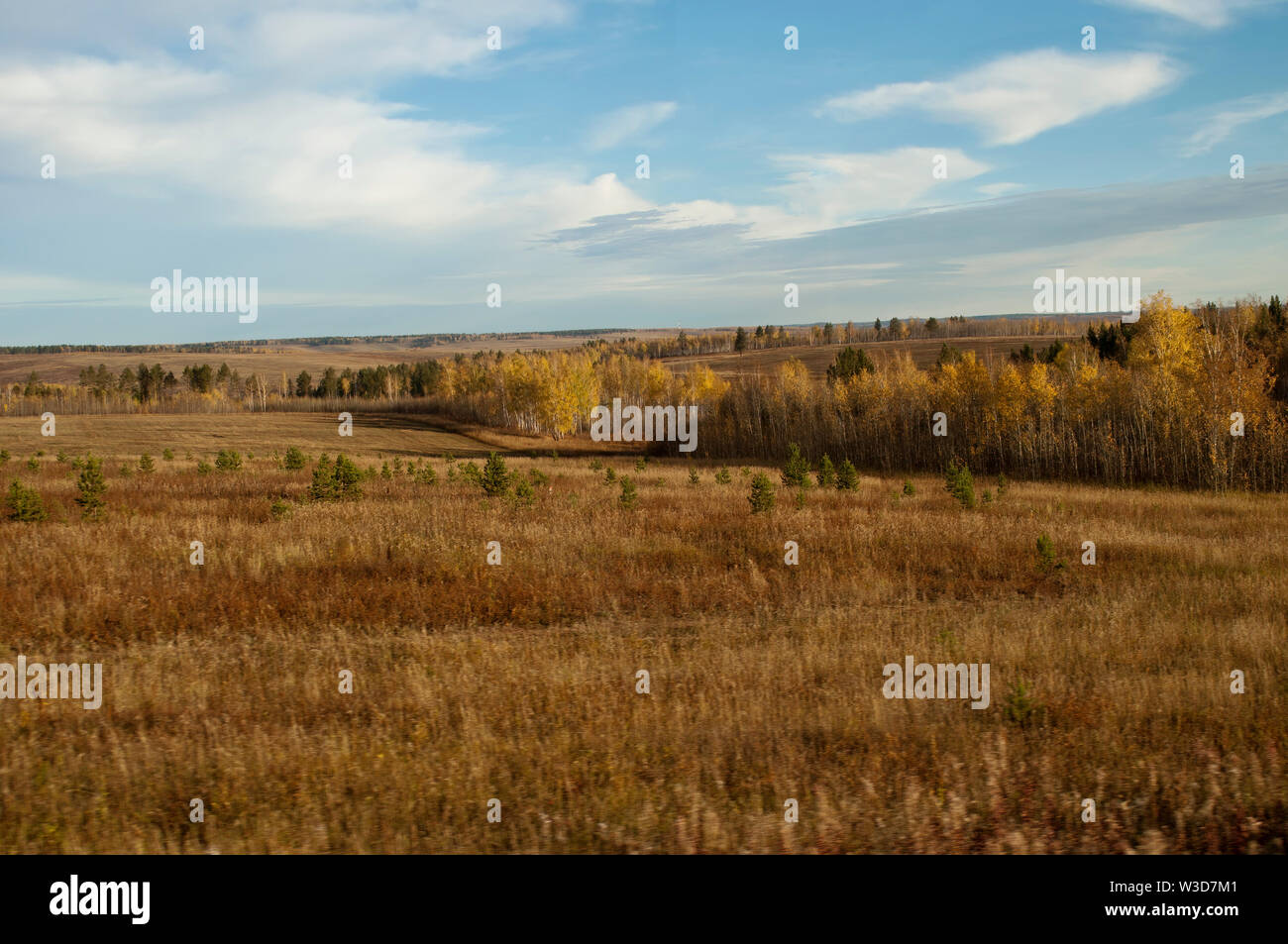Rural Siberia Russia, view of grasslands and fields between Irkutsk and Lake Baikal Stock Photo