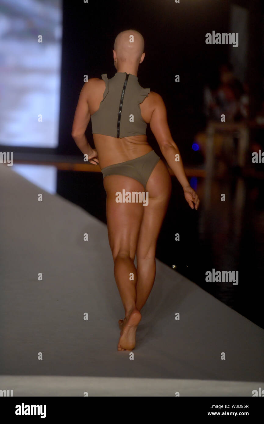 Miami Beach, Florida, USA. 14th July 2019. Christie Valdiserri walks the  runway during the 2019 Sports Illustrated Swimsuit Runway Show During Miami  Swim Week At W South Beach - Runway at WET