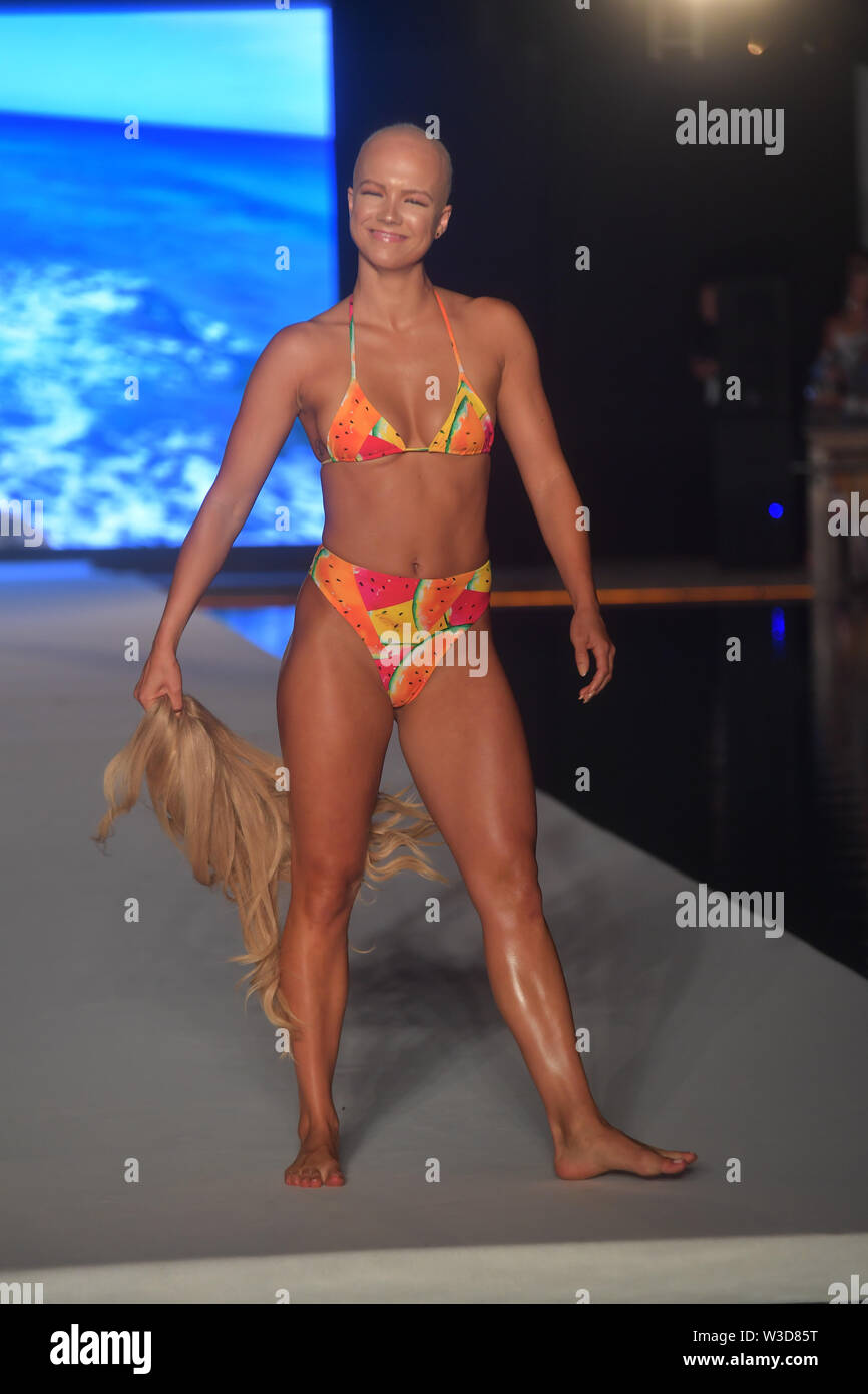 Miami Beach, Florida, USA. 14th July 2019. Christie Valdiserri walks the  runway during the 2019 Sports Illustrated Swimsuit Runway Show During Miami  Swim Week At W South Beach - Runway at WET