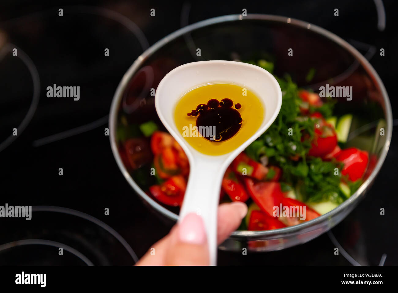 Preparation of salad from fresh vegetables, cucumbers, tomatoes and