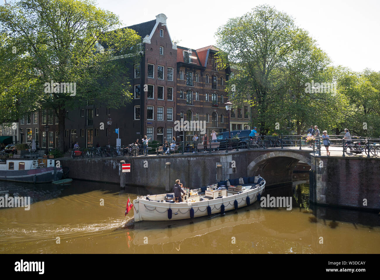 Amsterdam, Holland - June 22, 2019: Touring boat at the Brouwersgracht on a sunny day Stock Photo