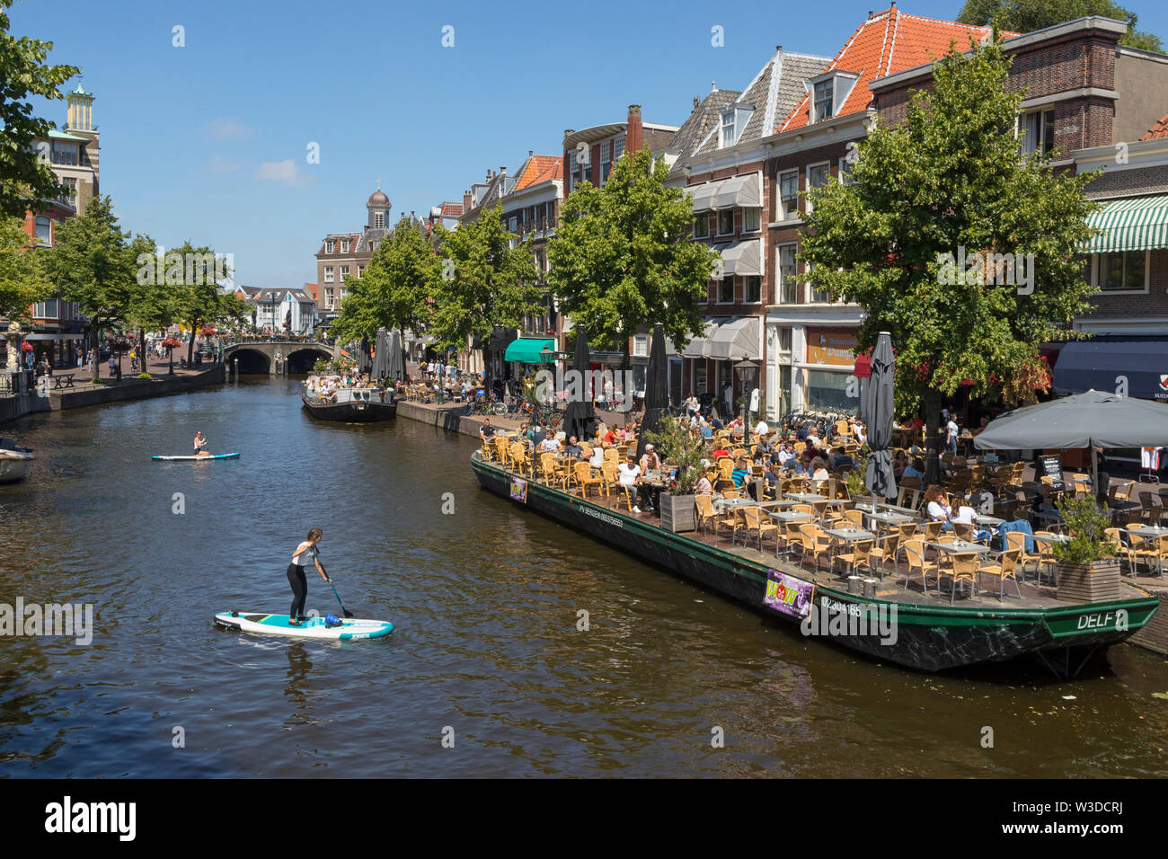 Leiden, Holland - June 26, 2019: Boat terrace on the canal at the Nieuwe Rijn in Leiden Stock Photo