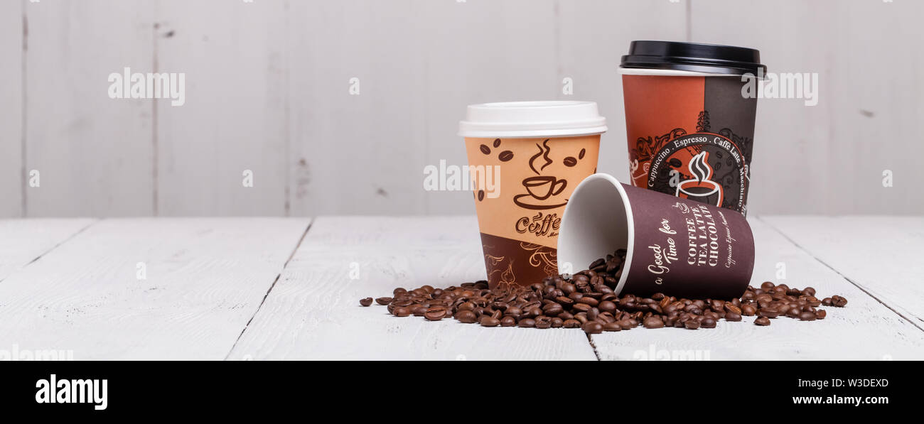 Download Paper Cups Of Coffee On Wooden Texture Background Stock Photo Alamy