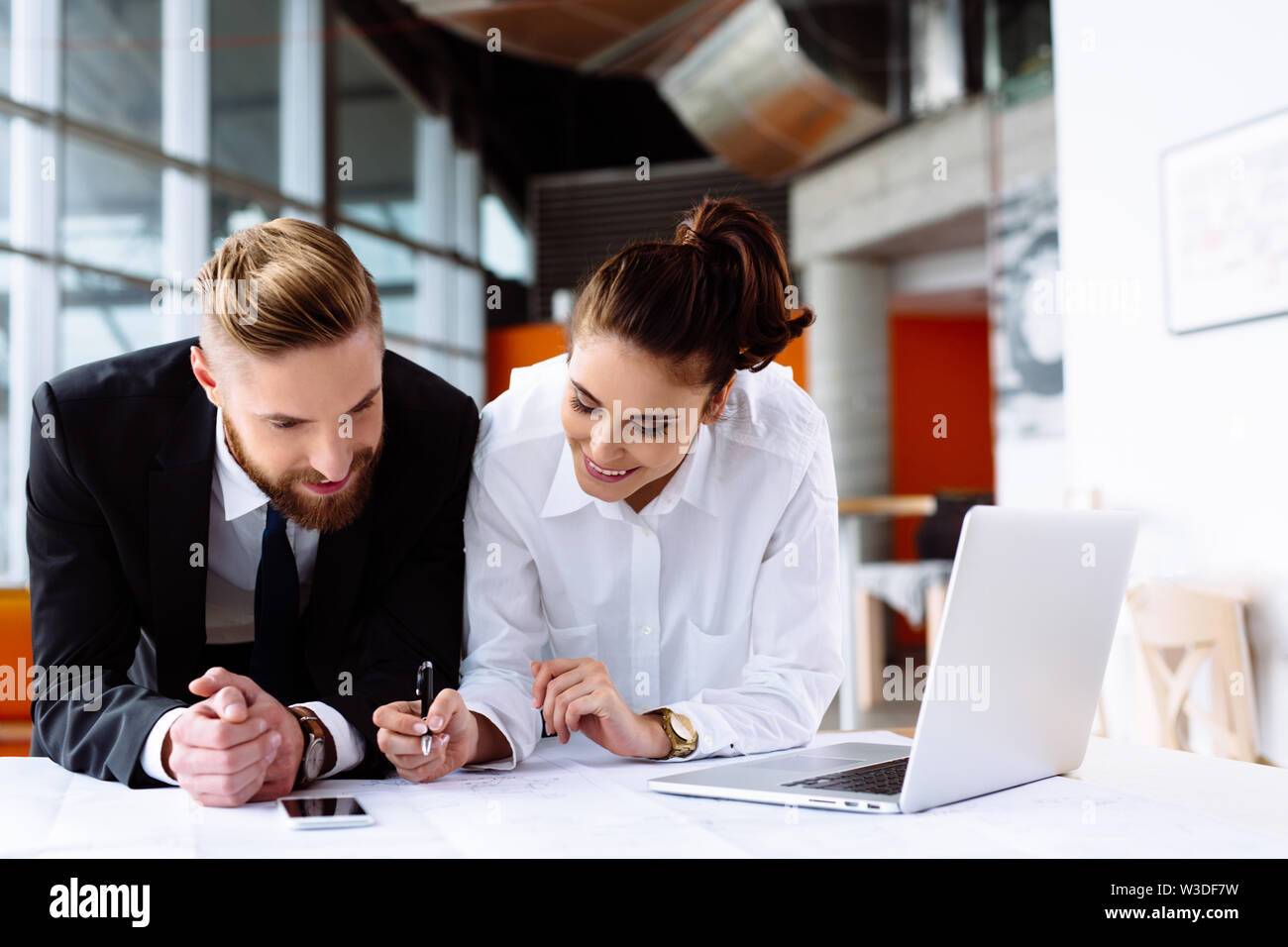 Successful business partners discussing their ideas Stock Photo