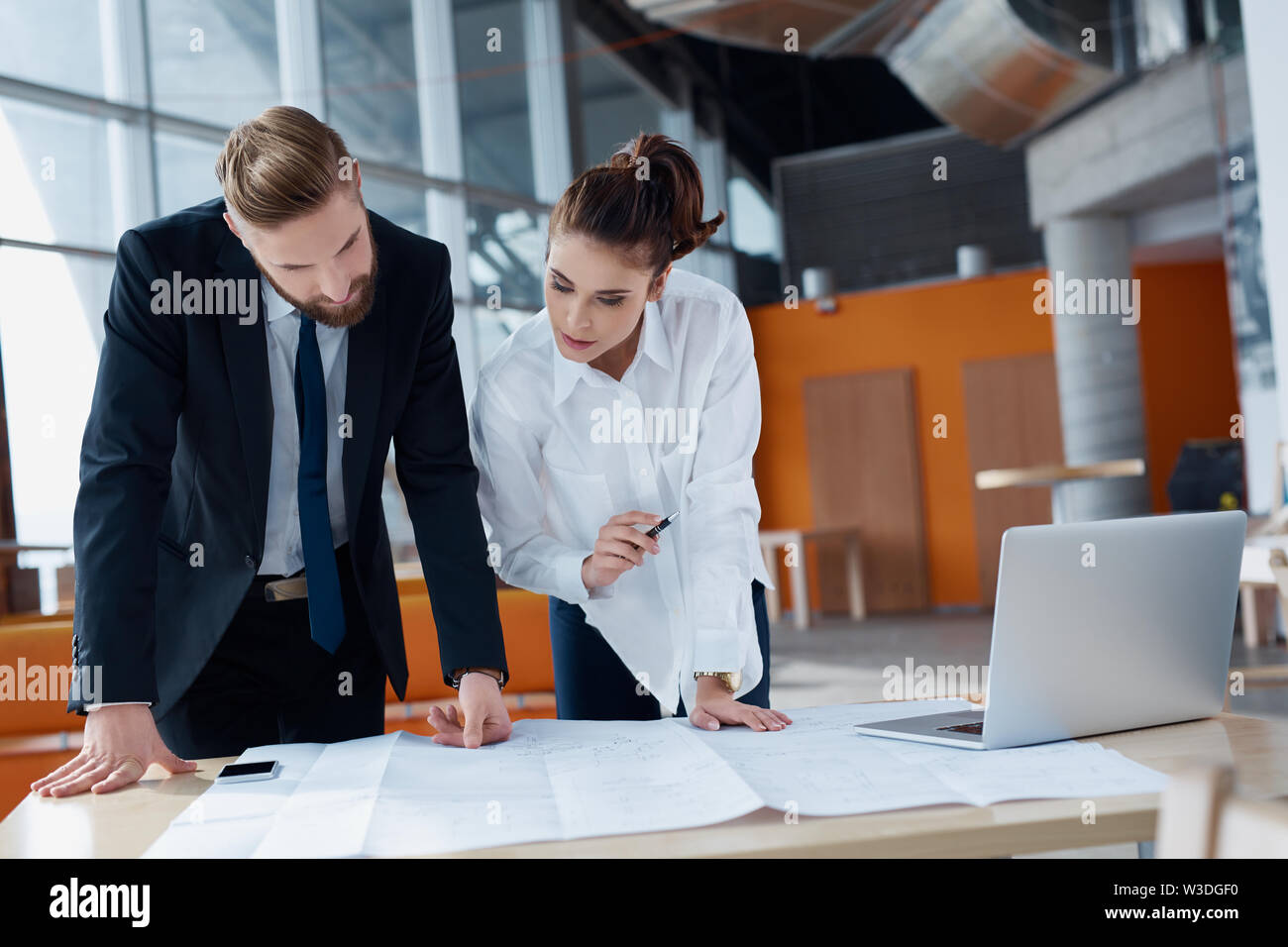 Two architects, designers discussing at office Stock Photo