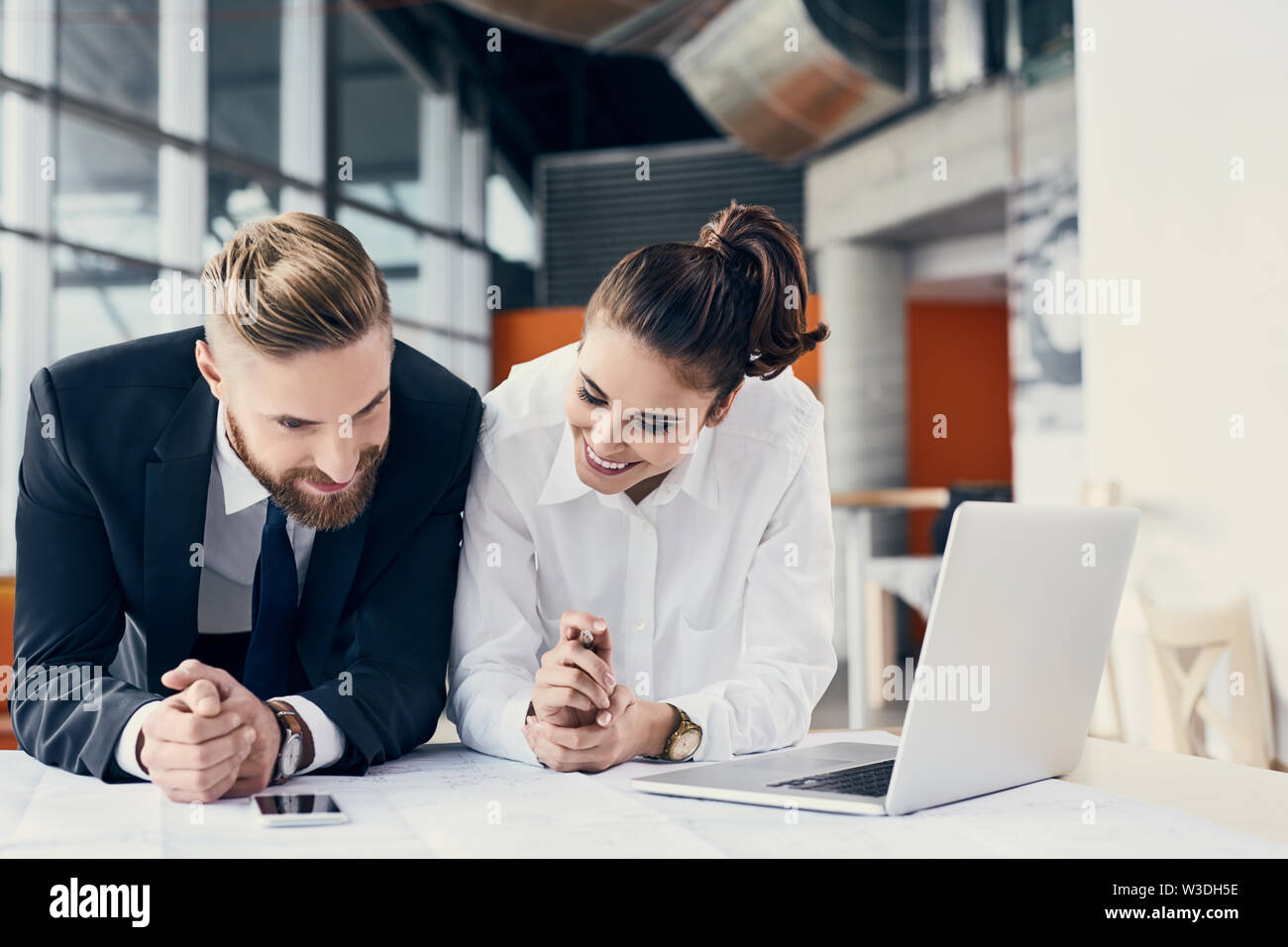 Two architects working together at modern office Stock Photo