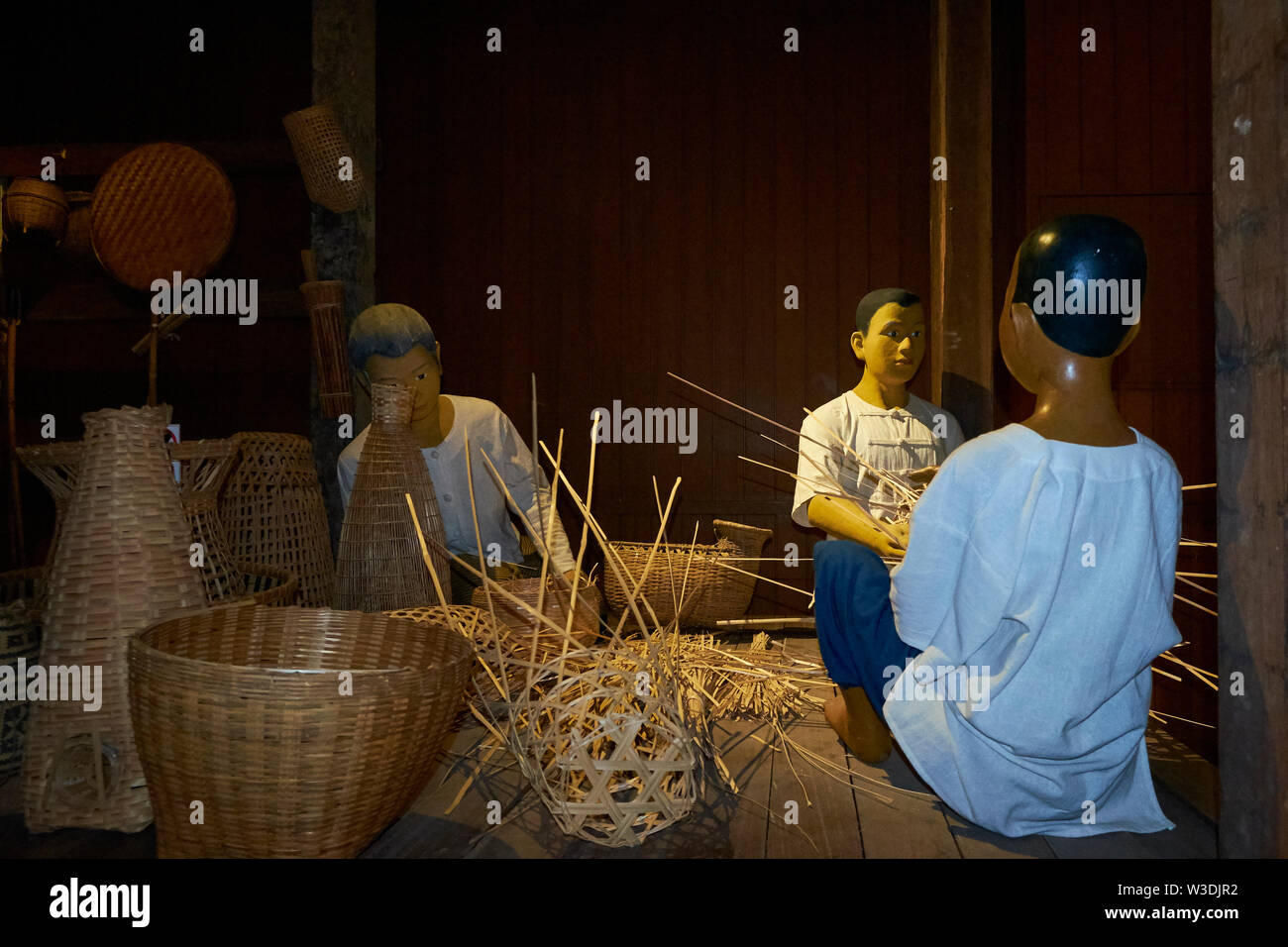 Basket weaving demonstration at the Lanna Folklore Museum in Chiang Mai, Thailand. Stock Photo