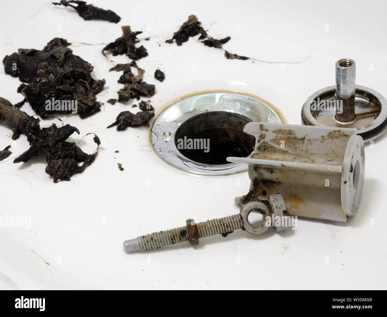 Clogged sink in the bathroom and pipe cleaning Stock Photo - Alamy