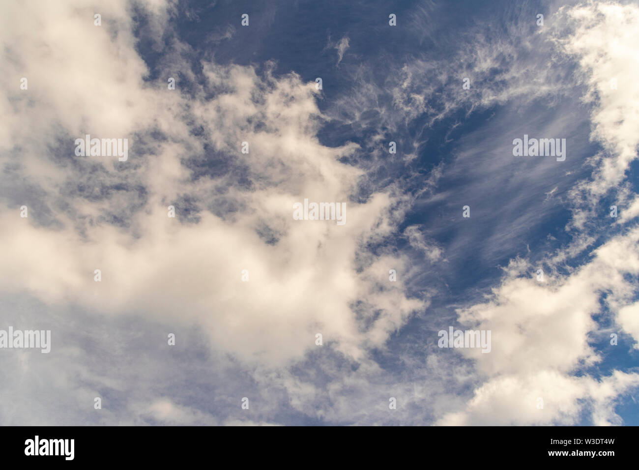 White cumulus clouds in blue sky at daytime. Natural background photo ...