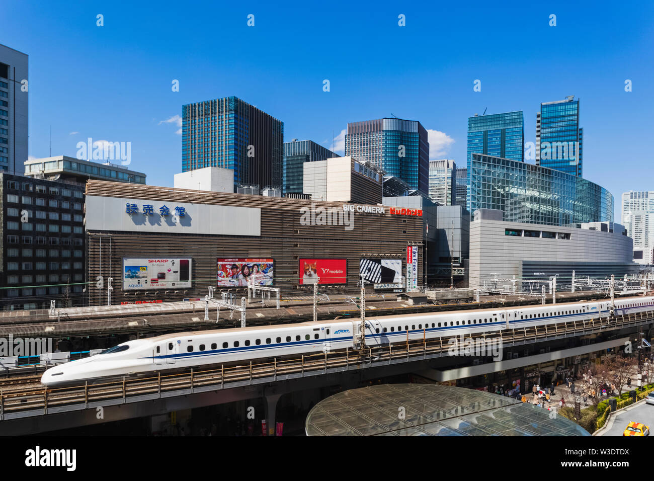 Japan, Honshu, Tokyo, Yurakucho, Skyline and Shinkansen Bullet Train Stock Photo