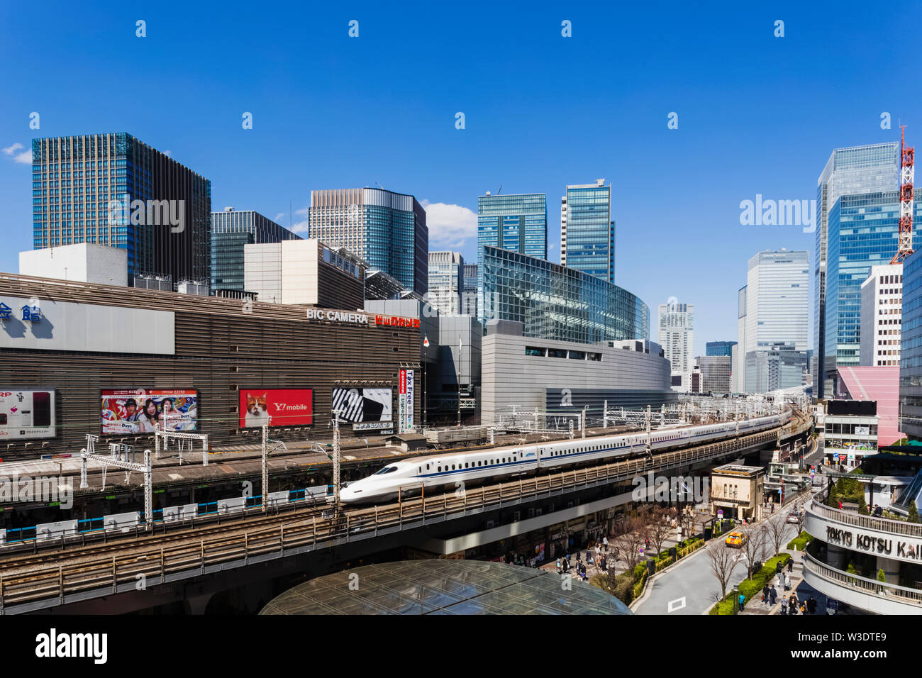 Japan, Honshu, Tokyo, Yurakucho, Skyline and Shinkansen Bullet Train