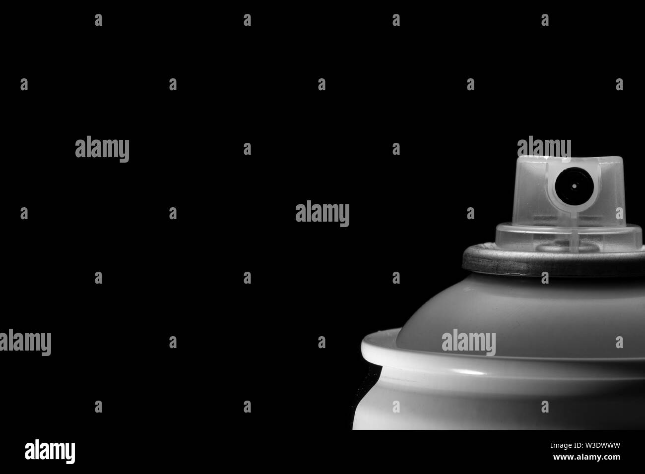 Top of a spray paint can isolated against a black background Stock Photo