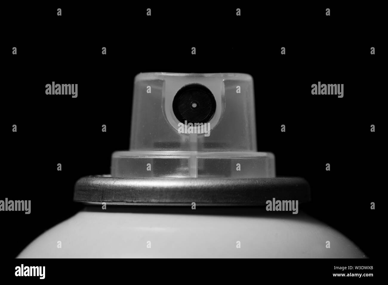 Top of a spray paint can isolated against a black background Stock Photo
