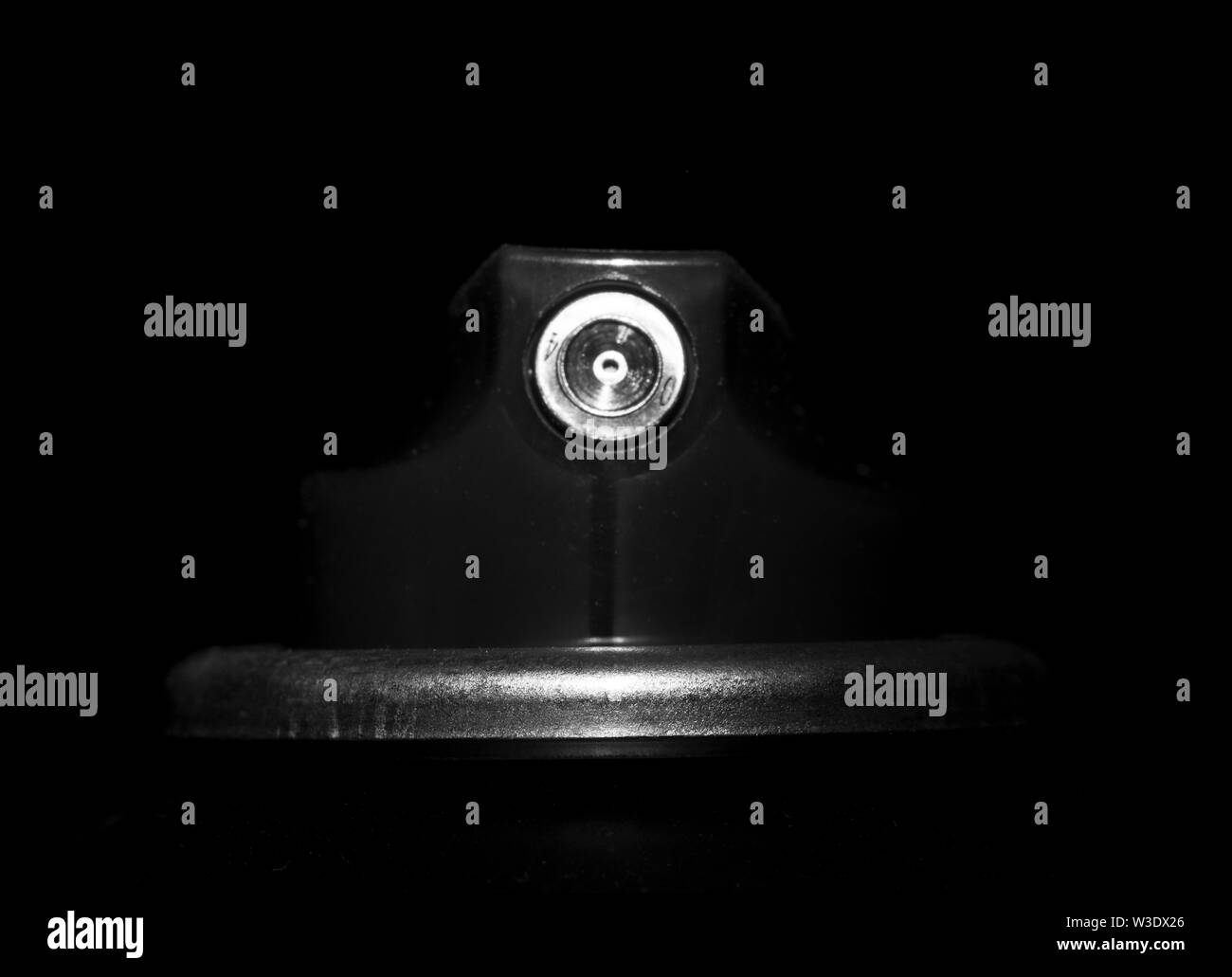 Top of a spray paint can isolated against a black background Stock Photo