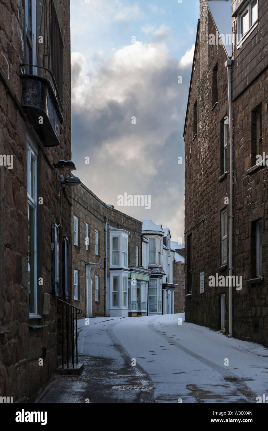 Hugh Street, Hugh Town, St. Mary's, Isles of Scilly, UK under a rare fall of snow Stock Photo