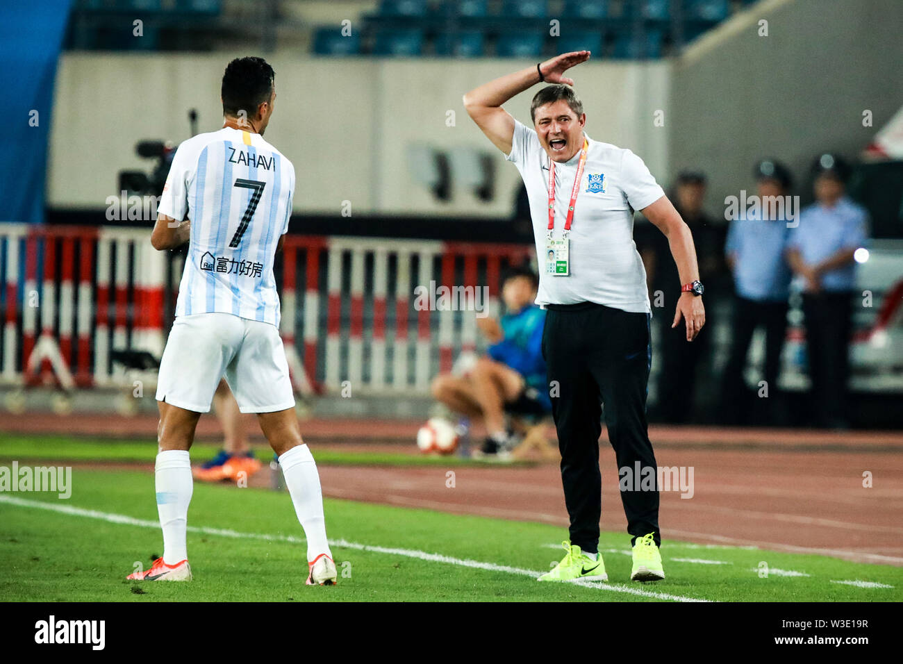 Head coach Dragan Stojkovic of Guangzhou R&F shouts instructions to his players as they compete against Dalian Yifang in their 17th round match during the 2019 Chinese Football Association Super League (CSL) in Dalian city, northeast China's Liaoning province, 12 July 2019. Dalian Yifang defeated Guangzhou R&F 3-2. Stock Photo