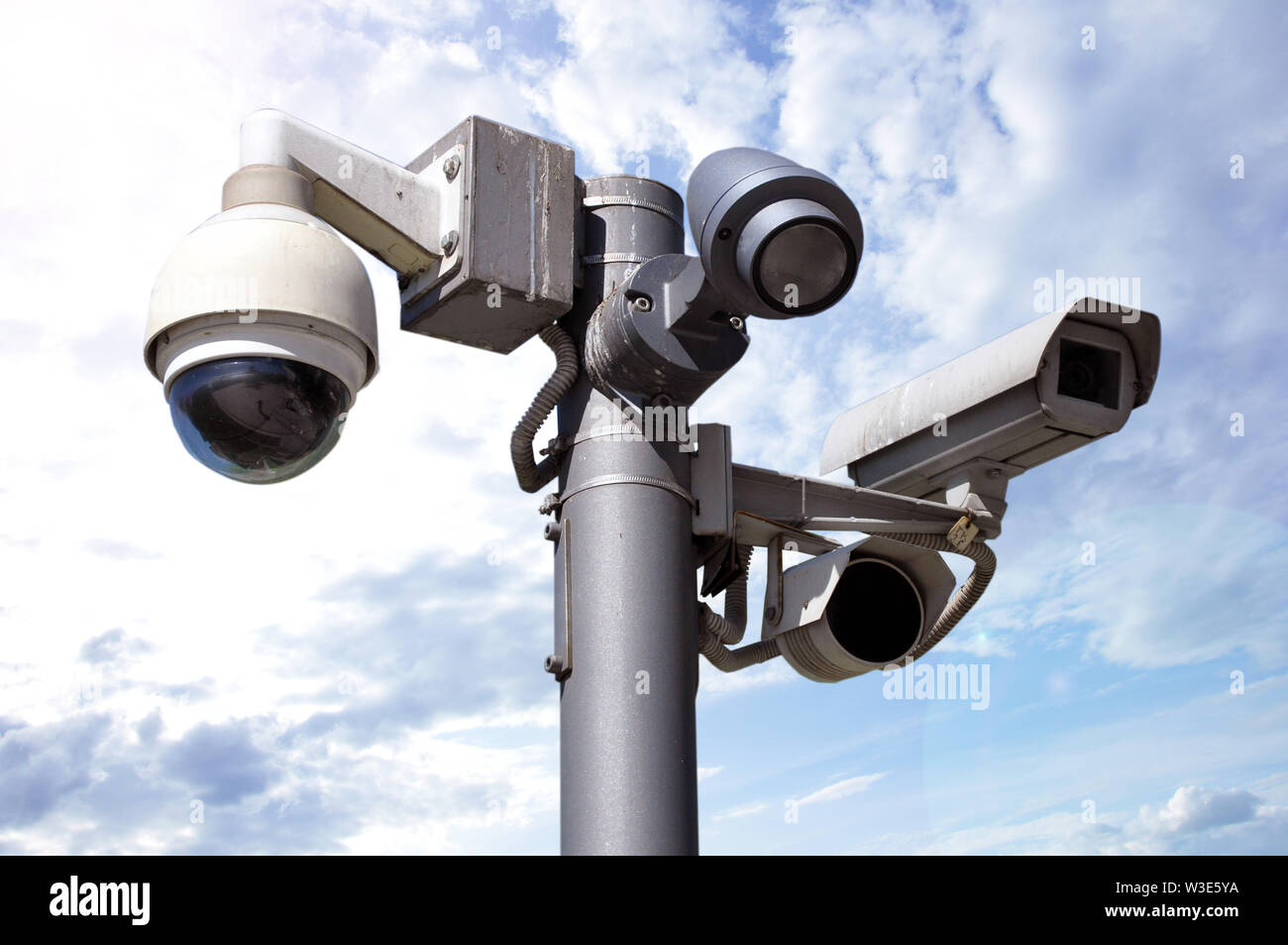 closed circuit camera Multi-angle CCTV system. against a blue sky with  clouds Stock Photo - Alamy