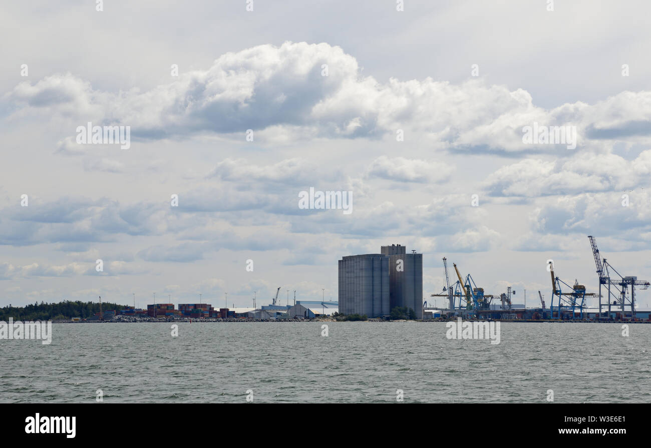 Rauma Finland 07/12/2019 Grain elevator and cranes in Rauma harbour on a shore of Bothnian sea. Stock Photo