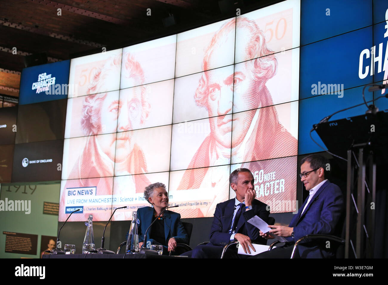 Governor of the Bank of England, Mark Carney (centre), during the announcement that Second World War code-breaker Alan Turing has been selected to feature on the next £50 note, at Science and Industry Museum, Manchester. Stock Photo