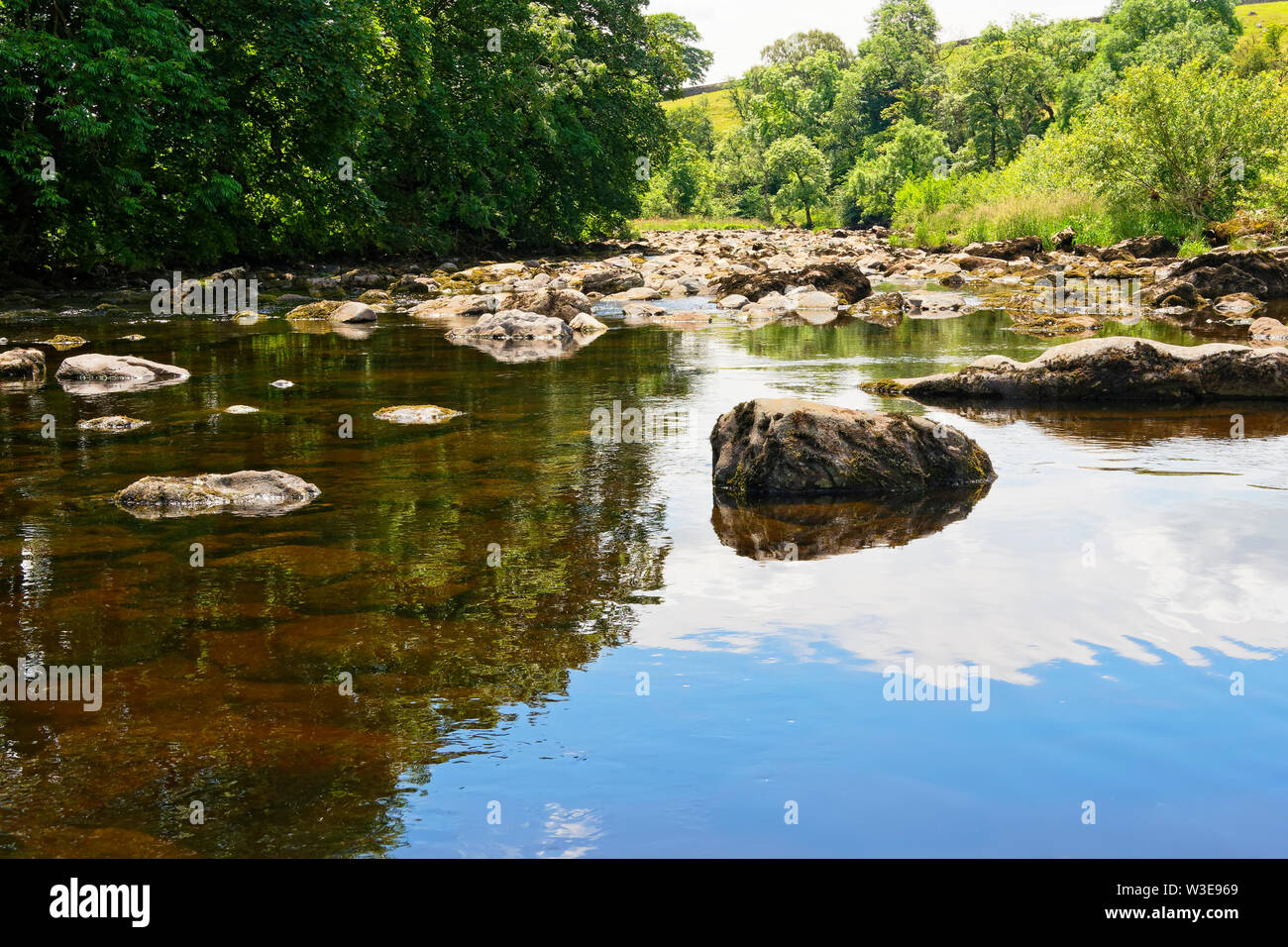 Jumbles Rocks Over the tops of the rocks and boulders that are scattered in the River ...
