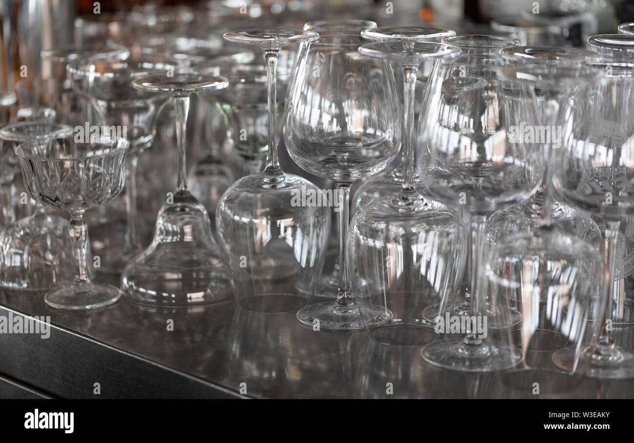 Glassware on a stainless steel hotel bar Stock Photo