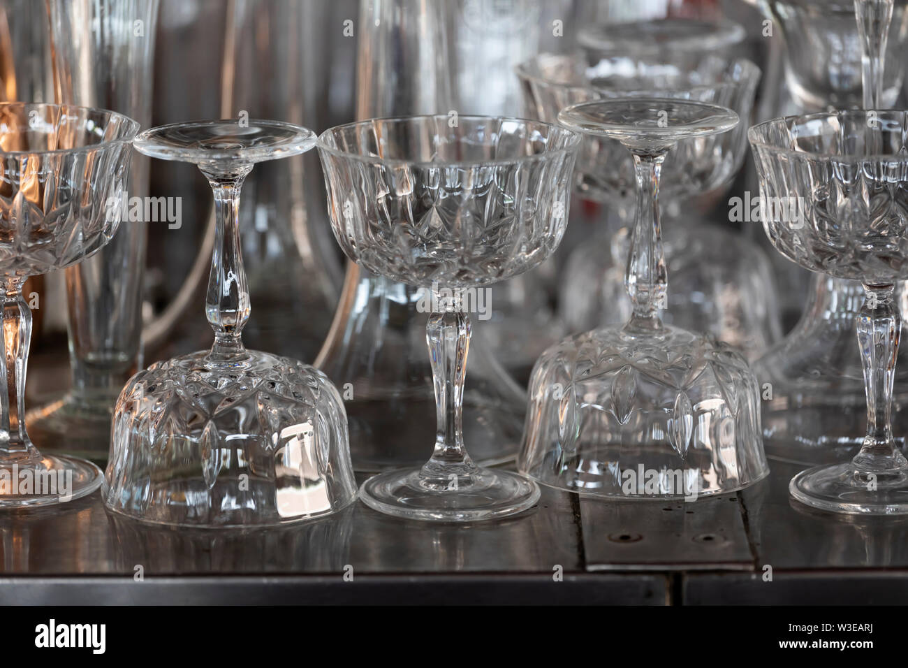 Glassware on a stainless steel hotel bar Stock Photo