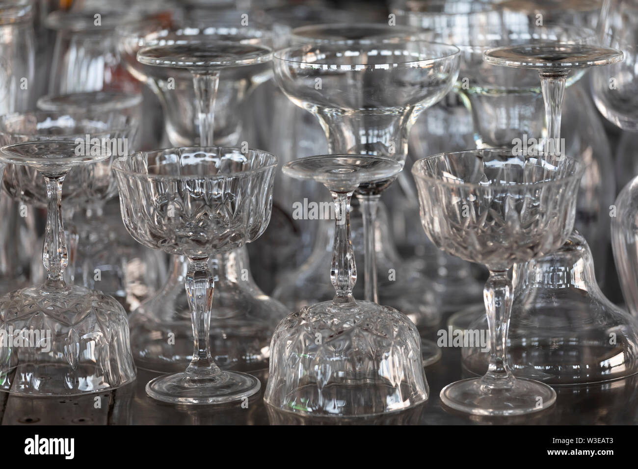 Glassware on a stainless steel hotel bar Stock Photo