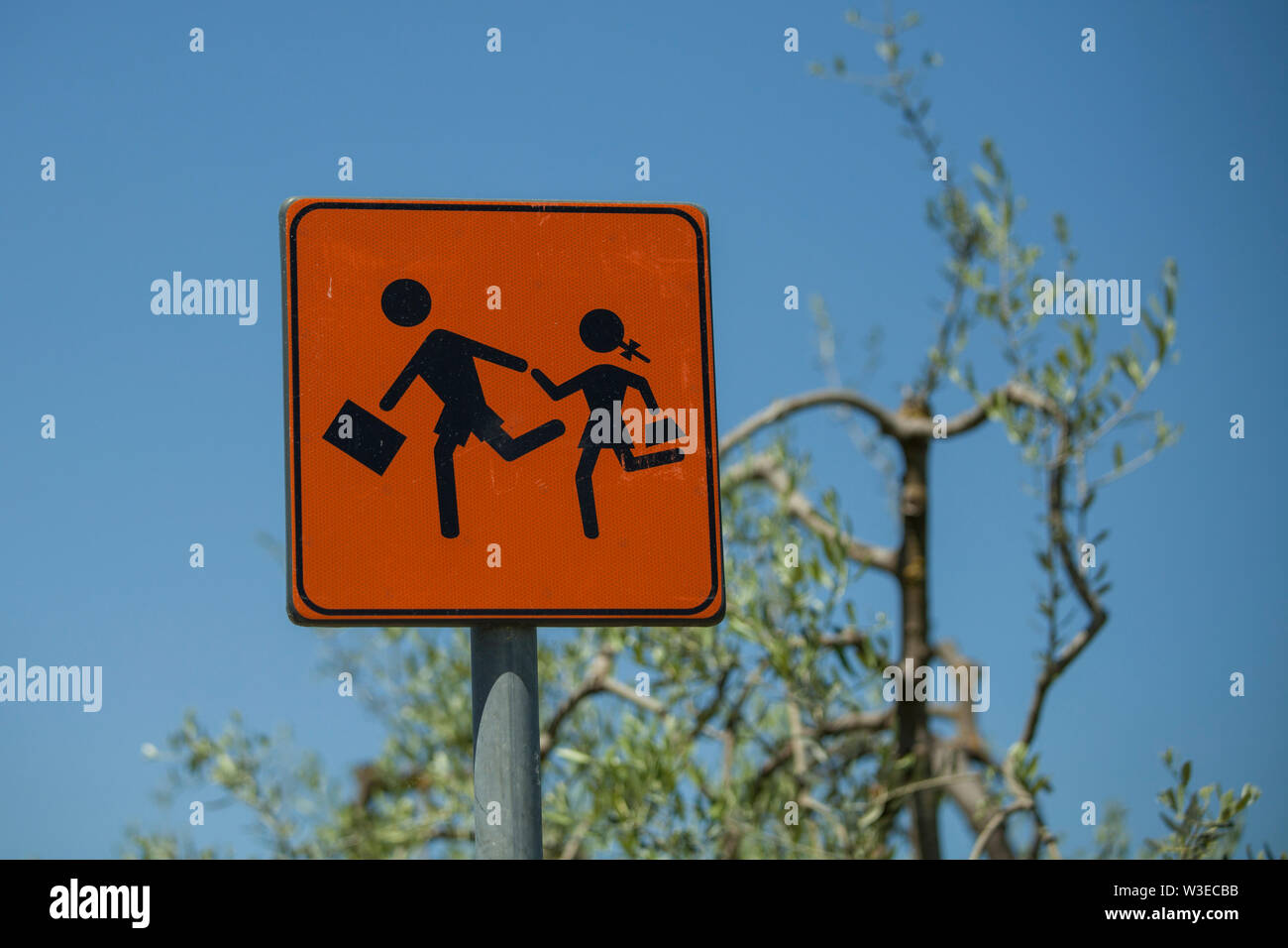 Children crossing the road, Italian traffic sign Stock Photo