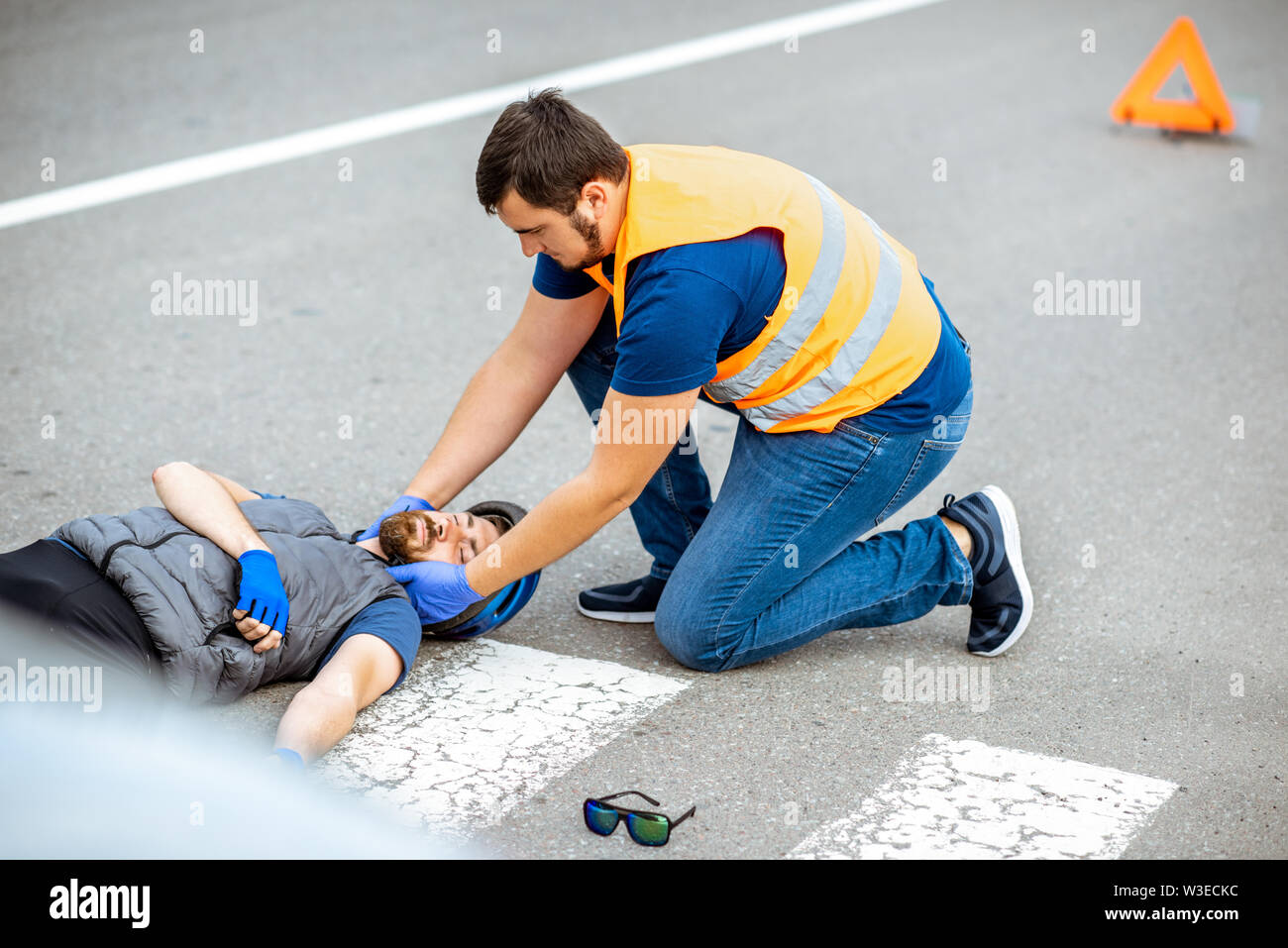 Road accident with injured cyclist on the pedestrian crossing with ...