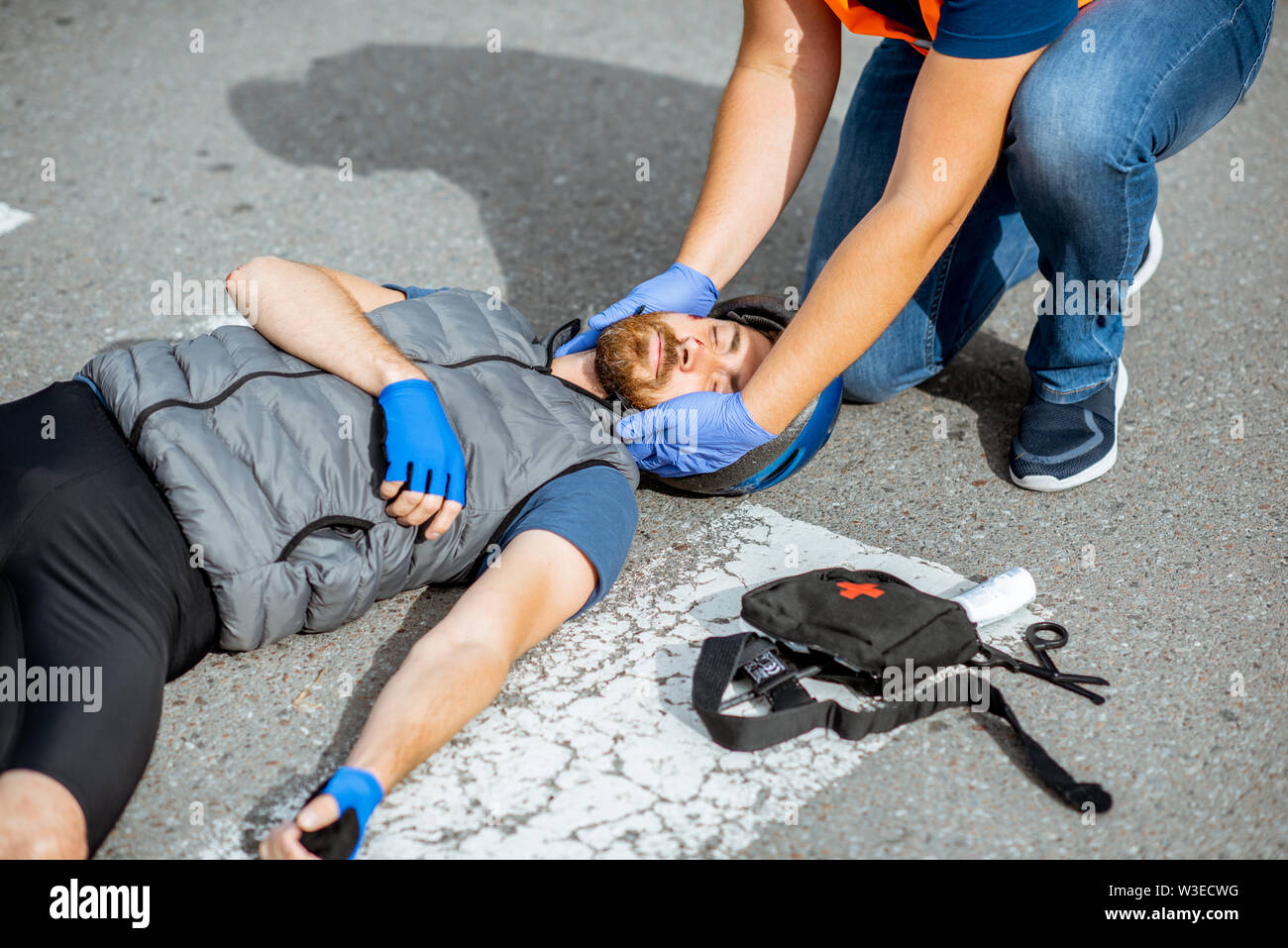 Road accident with injured cyclist on the pedestrian crossing with ...