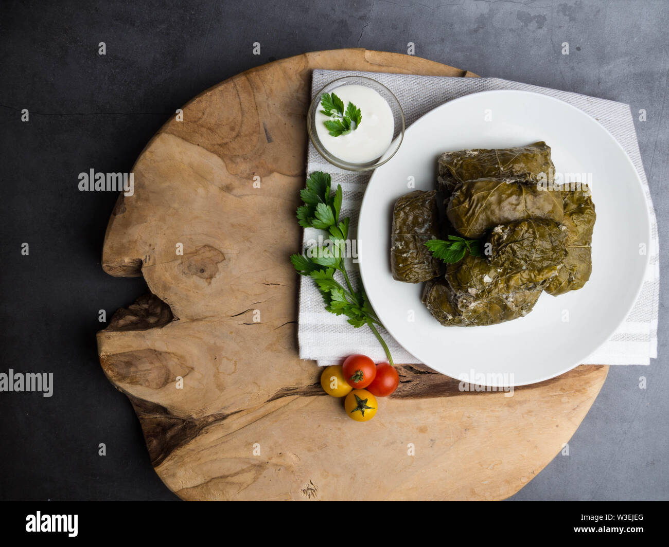 Delicious dolma sarma stuffed grape leaves rice, white yogurt sauce