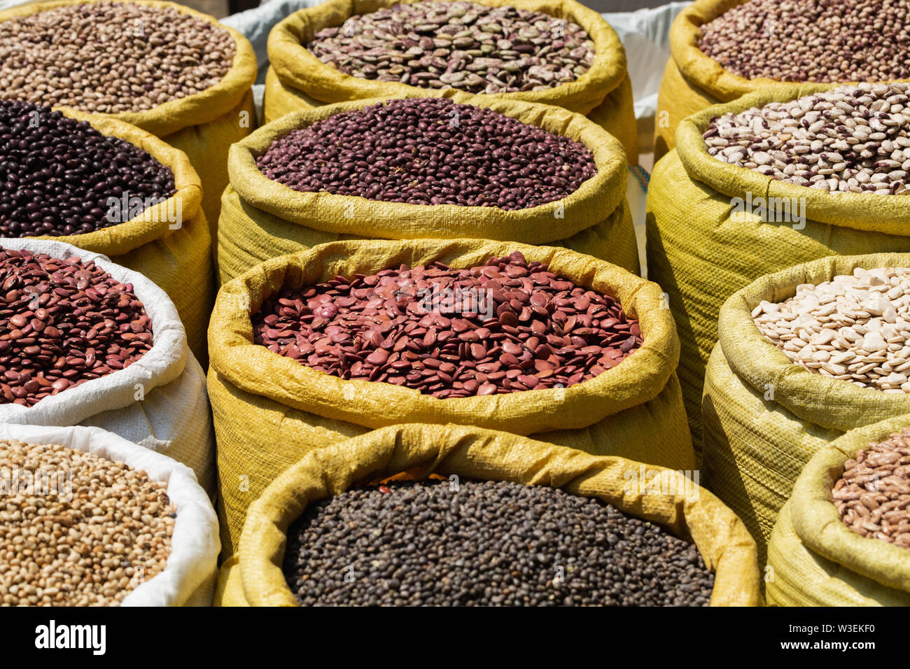 Different kinds of legumes beans in bulk bags on the market in Yangon