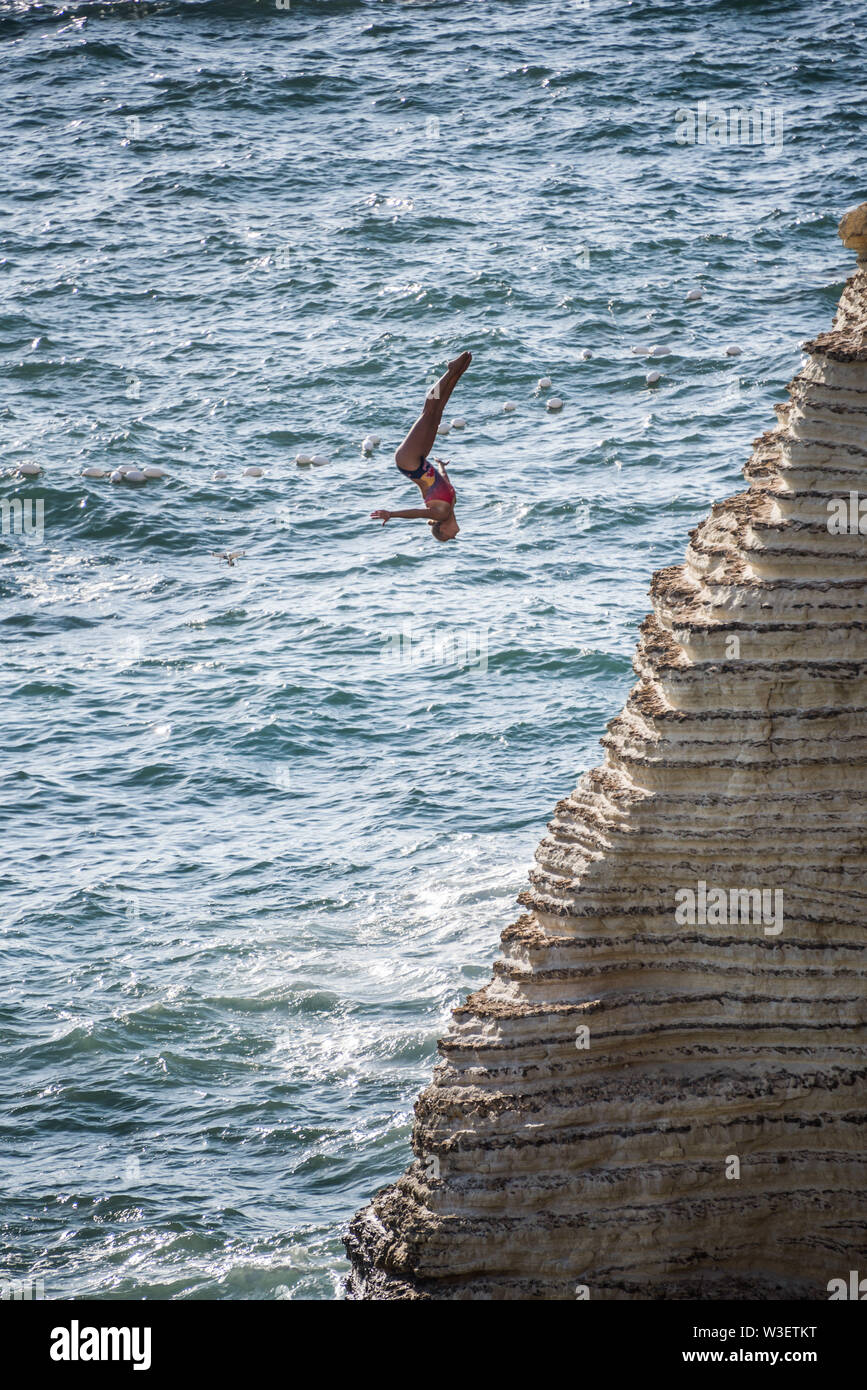 Competitors jump from Rauche Rocks, Beirut, launching from heights of up to 27m, for the Red Bull cliff diving world series 2019 Stock Photo