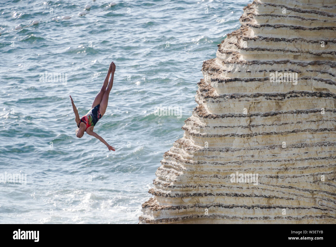 Competitors jump from Rauche Rocks, Beirut, launching from heights of up to 27m, for the Red Bull cliff diving world series 2019 Stock Photo