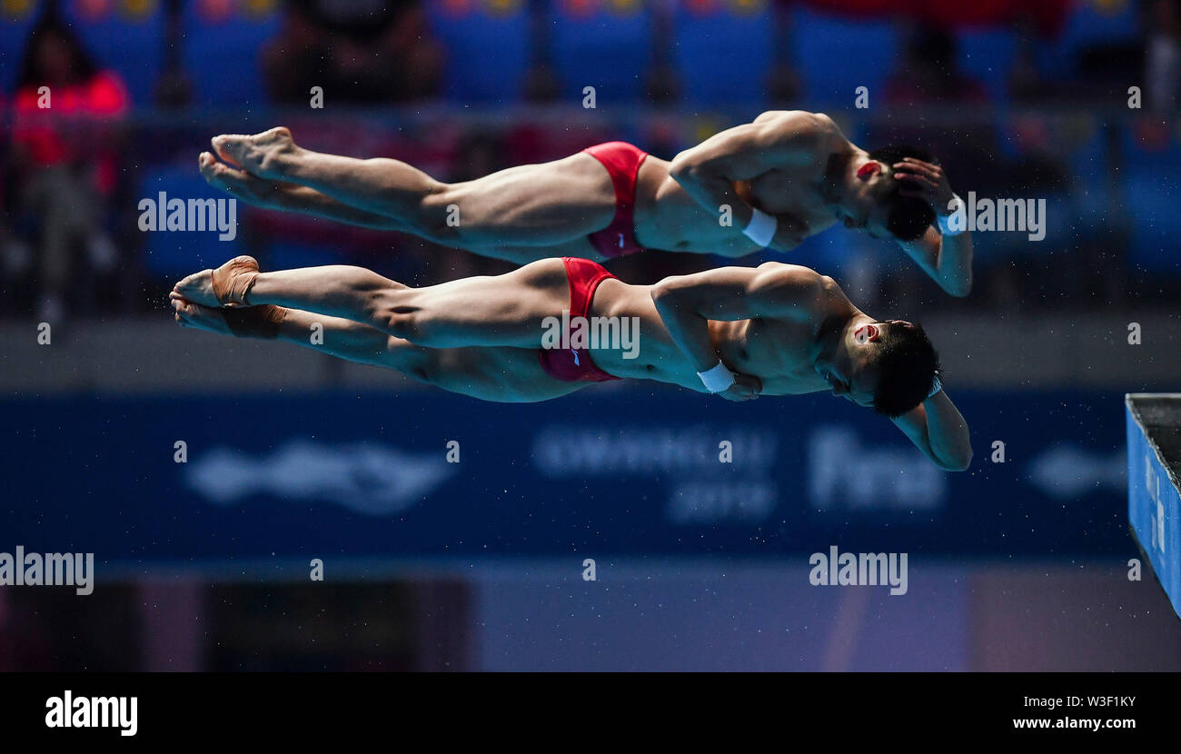 Gwangju. 15th July, 2019. Cao Yuan/Chen Aisen (front) of China compete during the men's 10m synchro platform final of diving event at FINA World Championships in Gwangju, South Korea on July 15, 2019. Credit: Xia Yifang/Xinhua/Alamy Live News Stock Photo