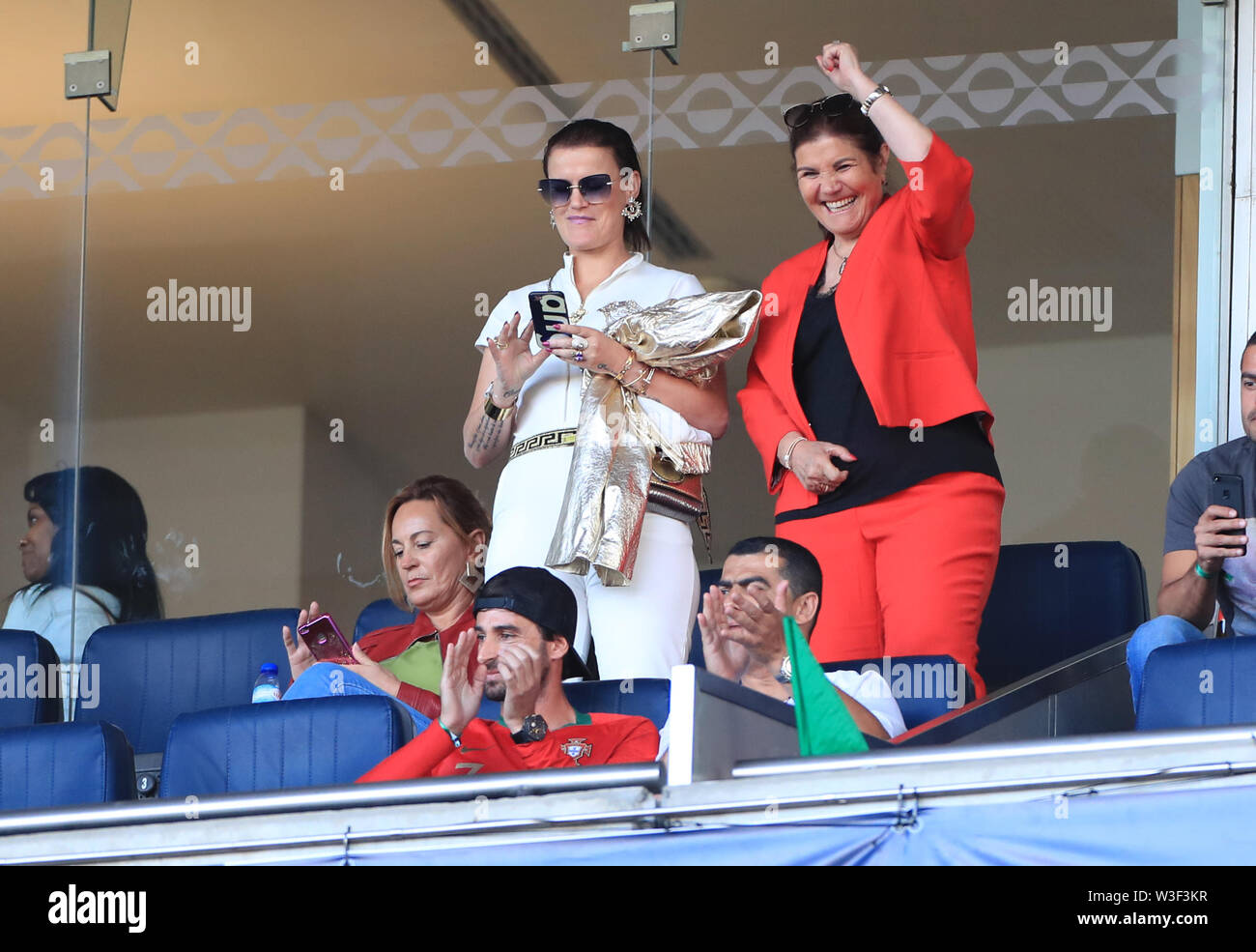 Maria Dolores Dos Santos Aveiro Elma Aveiro Elma Aveiro and Maria Dolores dos Santos Aveiro in the stands Stock
