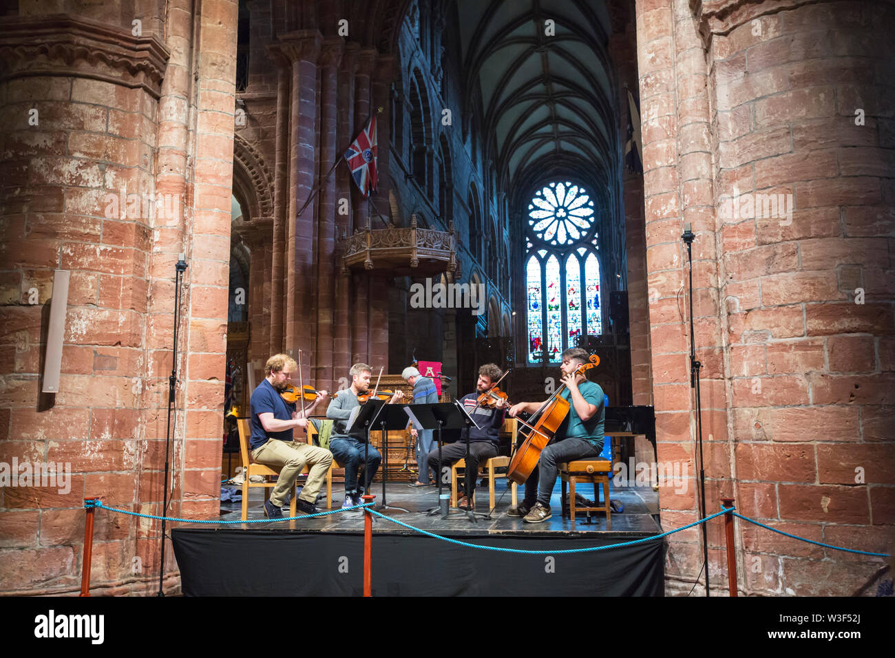 Musicians in St Magnus Cathedral in Kirkwall, Orkney, UK. Stock Photo