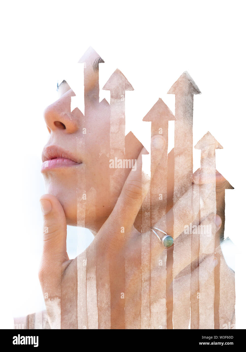 Paintography. Double exposure profile portrait disappearing behind arrows pointing upwards Stock Photo