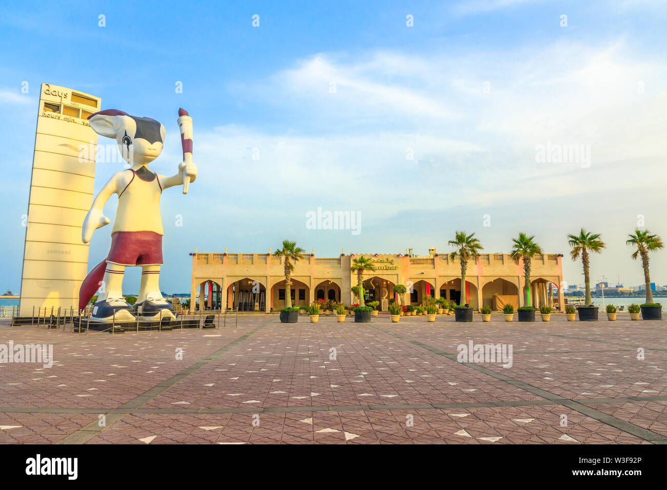 Doha, Qatar - February 23, 2019: Giant statue of Orry The Oryx, mascot of the Asian Games 2006 along the Corniche close to Al Mourjan luxury Stock Photo