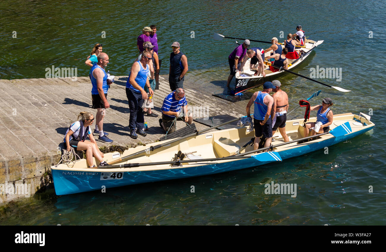 crews taking part in an inshore rowing regatta Stock Photo