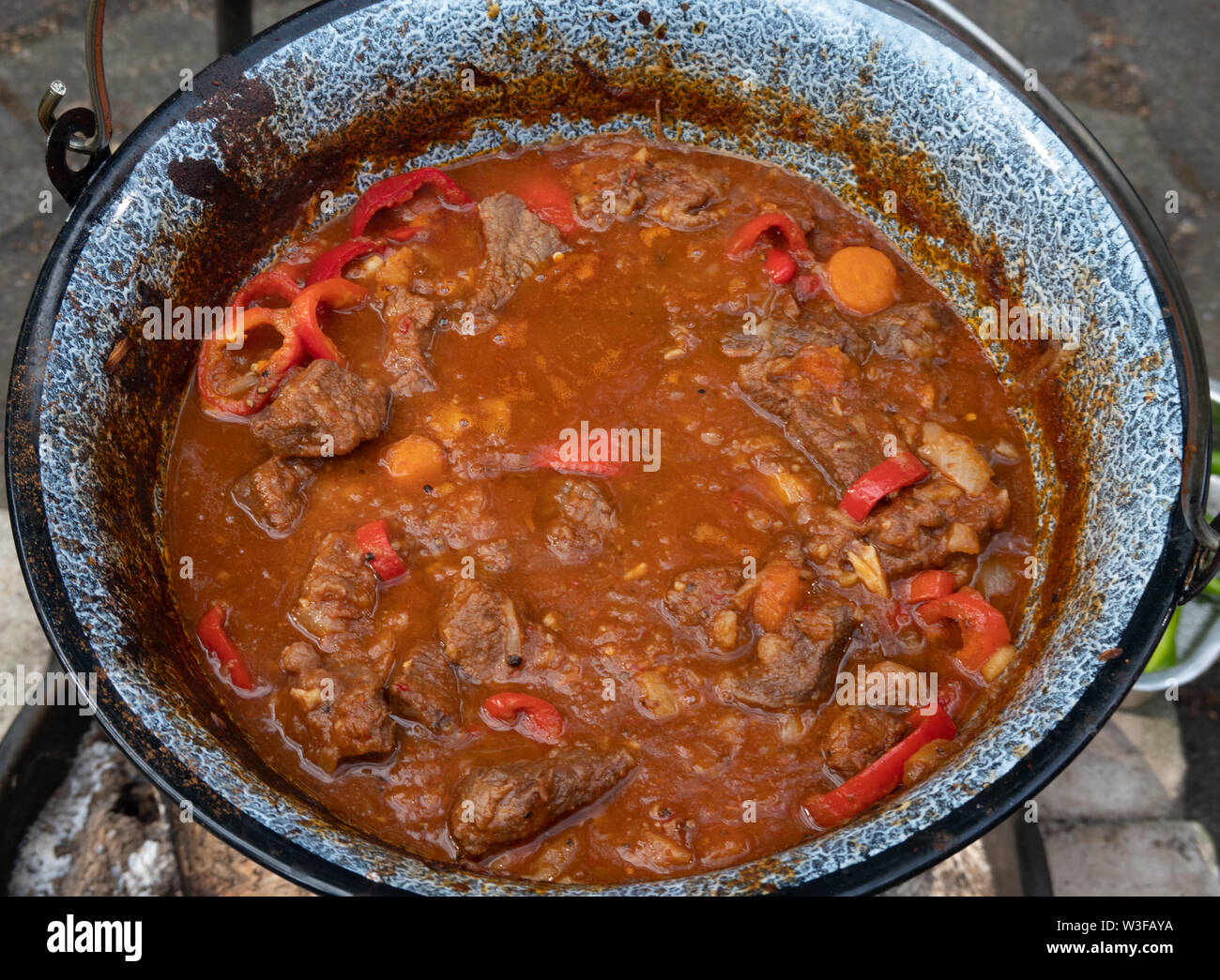 Ready kettle goulash after four hours cooking time over an open wood