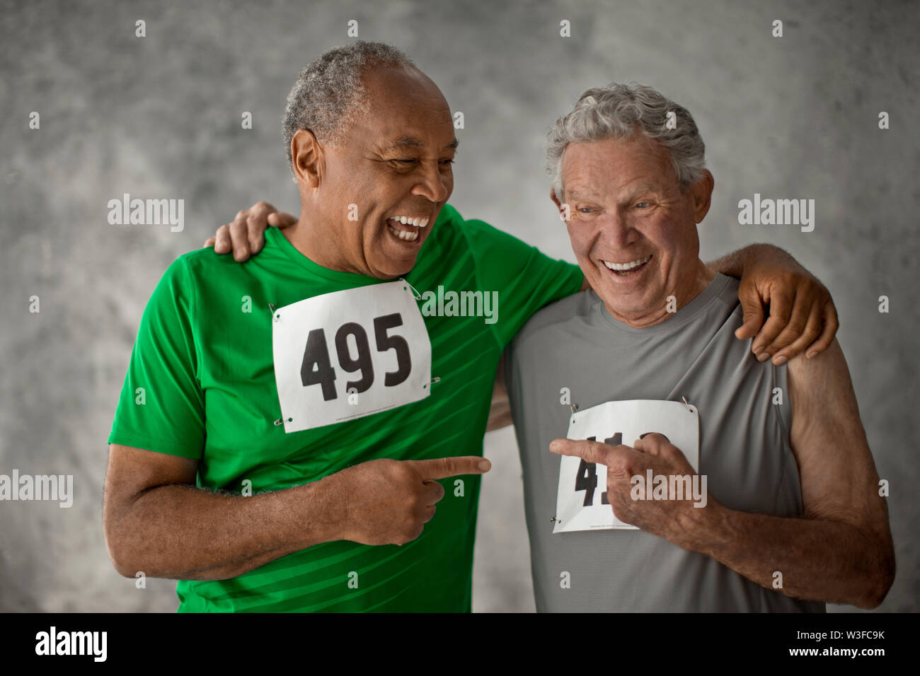 Portrait of two smiling senior men. Stock Photo