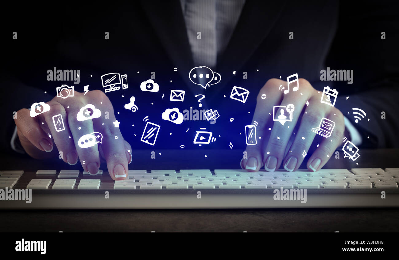 Blogger woman typing on keyboard with drawn application icons around ...