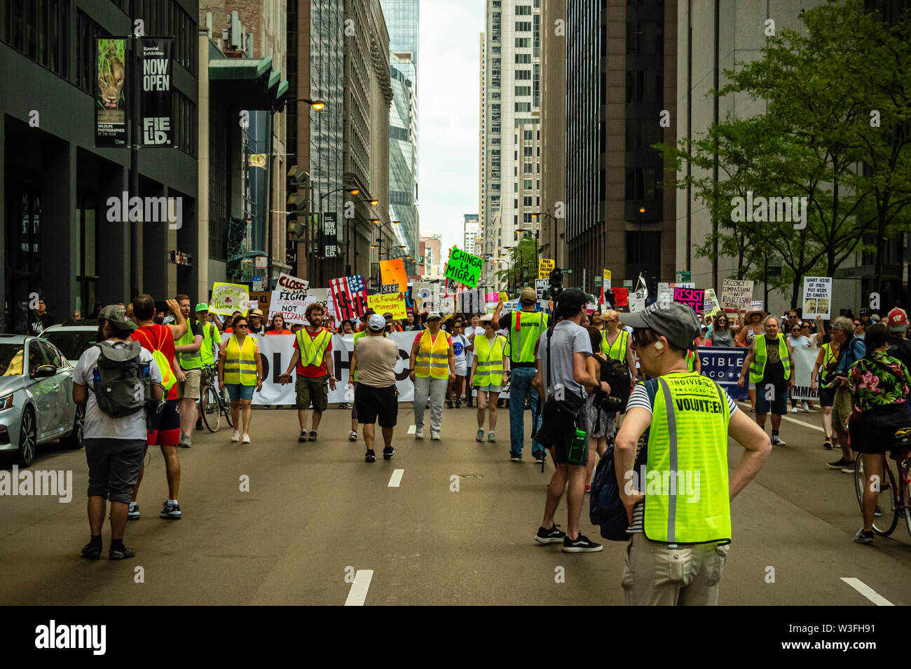 Downtown, Chicago-July 13, 2019: Protest against ICE and Customs and Border Patrol Detention Centers. Marching through streets. Stock Photo